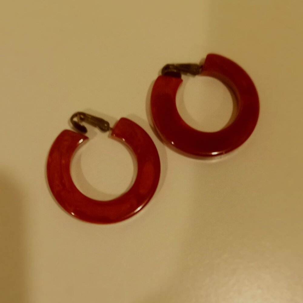 Vintage lovely bakelite hoop earrings appx. 1 1/2 " across